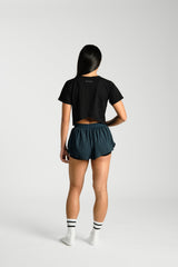 Back view, full length, KYDRA Cross Back Tee in Black #color_Black