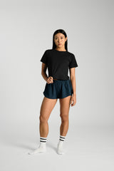 Full length front view, KYDRA Cross Back Tee in Black #color_Black