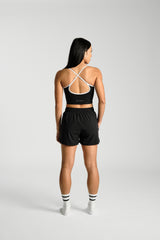 Back view, full length, KYDRA Kara Flex Shorts in Black #color_Black