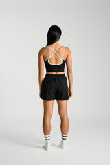 Back view, full length, KYDRA Lexa Longline Bra in Black #color_Black
