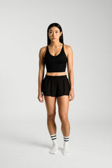 Full length front view, KYDRA Pleated Shorts in Black #color_Black