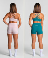 KYDRA Kaira Bra and Kyro 3 inch Bike Shorts in Pink and in Emerald, back view