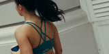 Kaira Bra in Emerald with Kara Flex Shorts in Black, Singapore street
