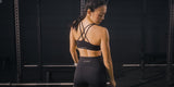 Kaira Bra and shorts in black, in the gym